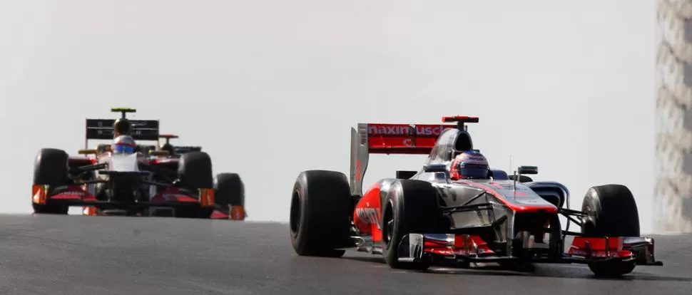 EXTREMO. El piloto Button sufrió un intento de secuestro el año pasado camino al circuito de Interlagos. REUTERS