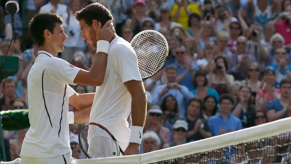 RECONOCIMIENTO. Nole debió batallar para derrotar al argentino en cinco sets. EUTERS