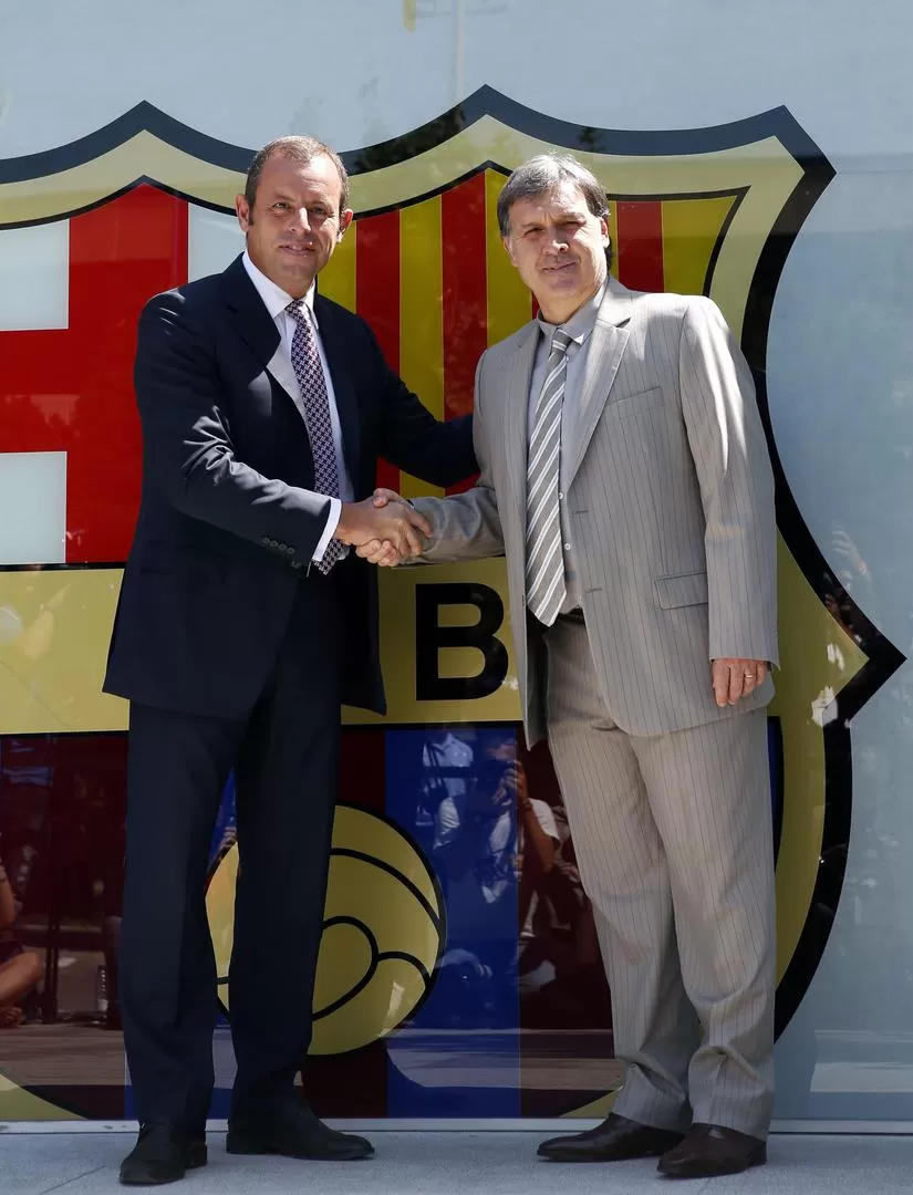 MUNDO FELIZ. Durante la conferencia de prensa, el flamante entrenador rosarino siempre respondió con una sonrisa. REUTERS