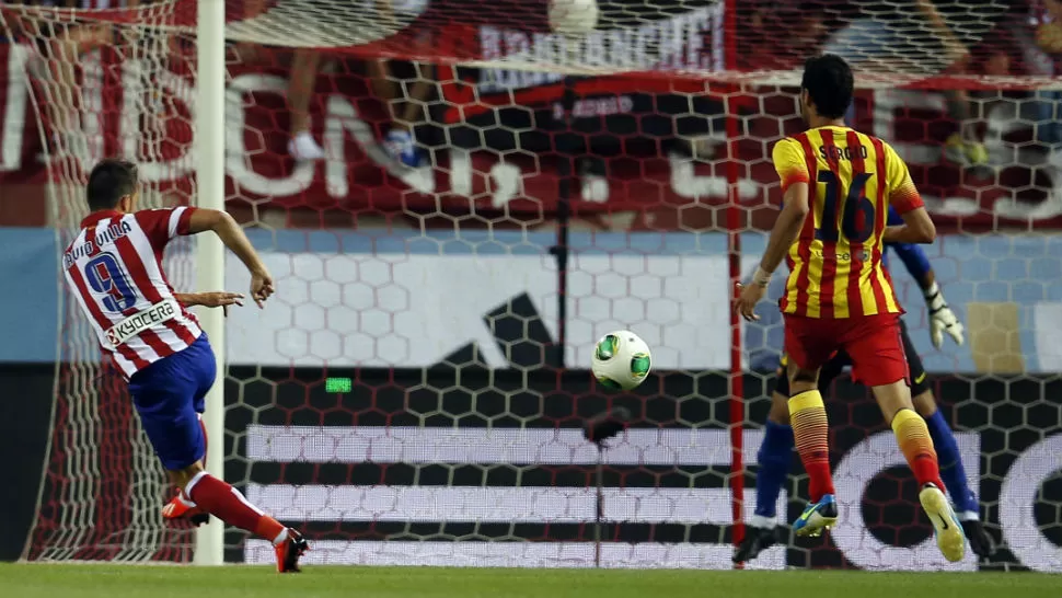 GOLAZO. Villa marcó el primer tanto. REUTERS