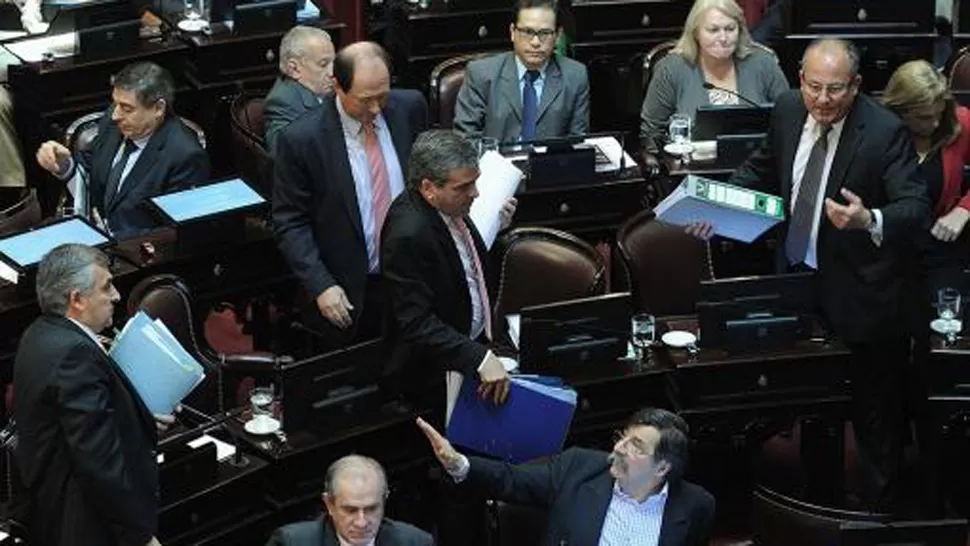 DISIDENCIA. El bloque de senadores de la UCR se retiró del recinto. TÉLAM