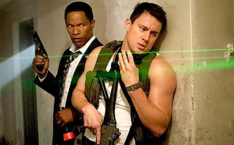 ARMADOS. Channing Tatum cuida a Jamie Foxx, presidente de EEUU. 