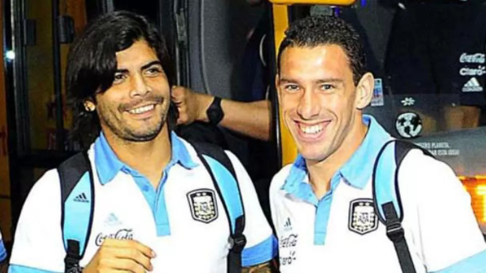 COMPAÑEROS. Ever Banega y Maxi Rodríguez estarán juntos en Rosario y la selección. FOTO TOMADA DE LACAPITAL.COM.AR