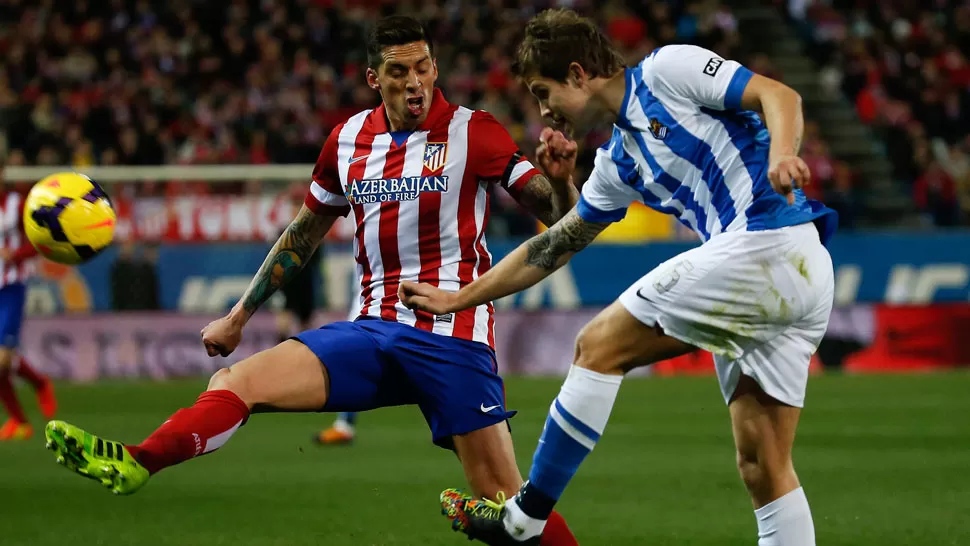 FESTEJO. Atlético de Madrid ganó y se trepó a la cima en España. REUTERS