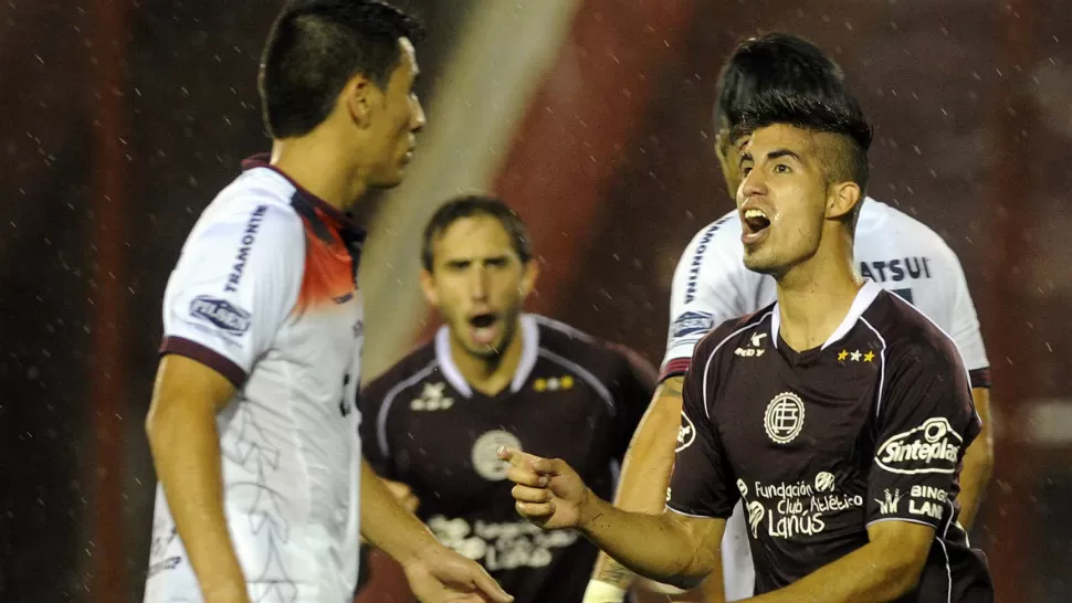 FESTEJO GRANATE. Lanús le ganó a Cerro Porteño 2 a 0 y volvió a soñar com la clasificación a los octavos de final de la Copa Libertadores. TELAM