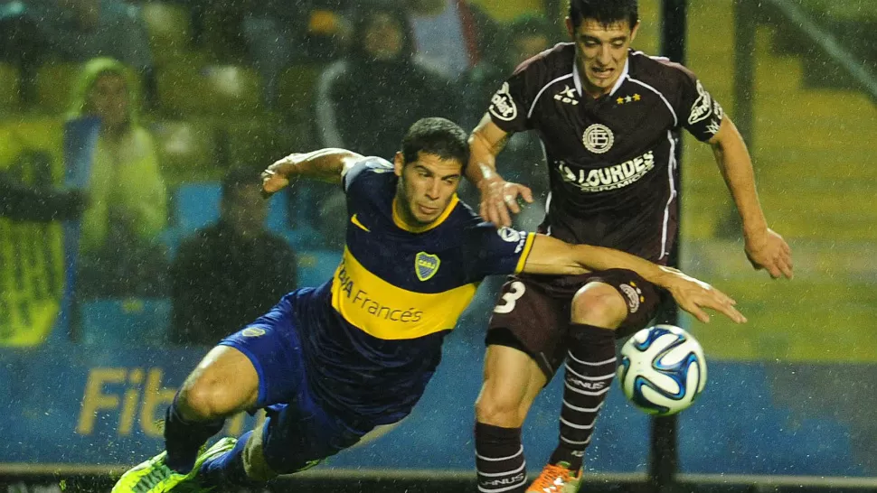 BUENA NOCHE. Boca jugó un muy buen partido y derrotó a Lanús, por 3 a 1. TELAM