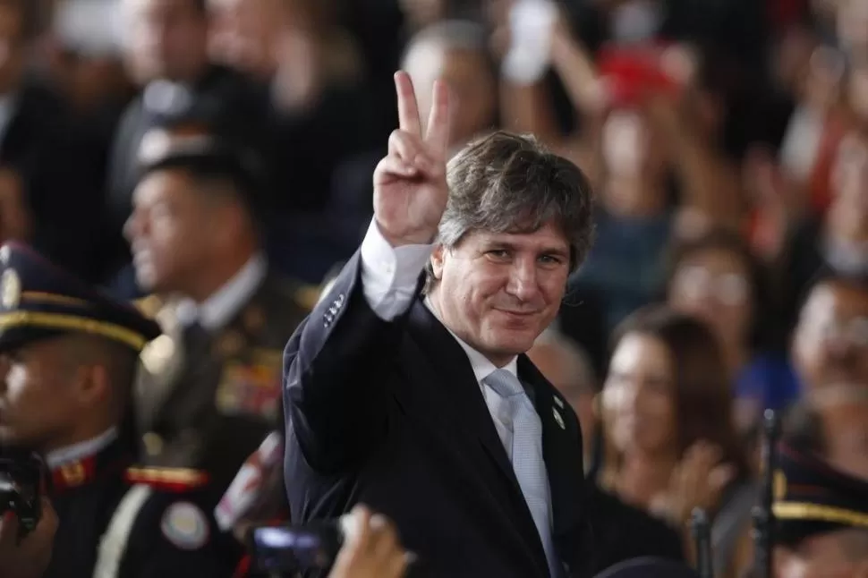 EN EL SALVADOR. Boudou se mostró sonriente, como si no lo afectara la citación a declaración indagatoria. REUTERS