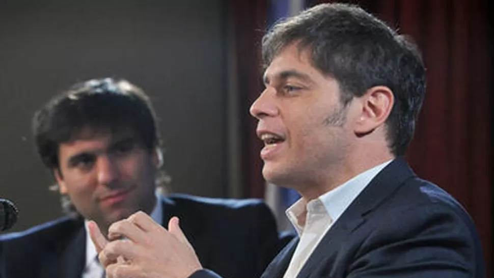 DEFENSA DEL MODELO. kicillof (en primer plano), volvió a quejarse por la manera en que informan los diarios. FOTO TOMADA DE IPROFESIONAL.COM