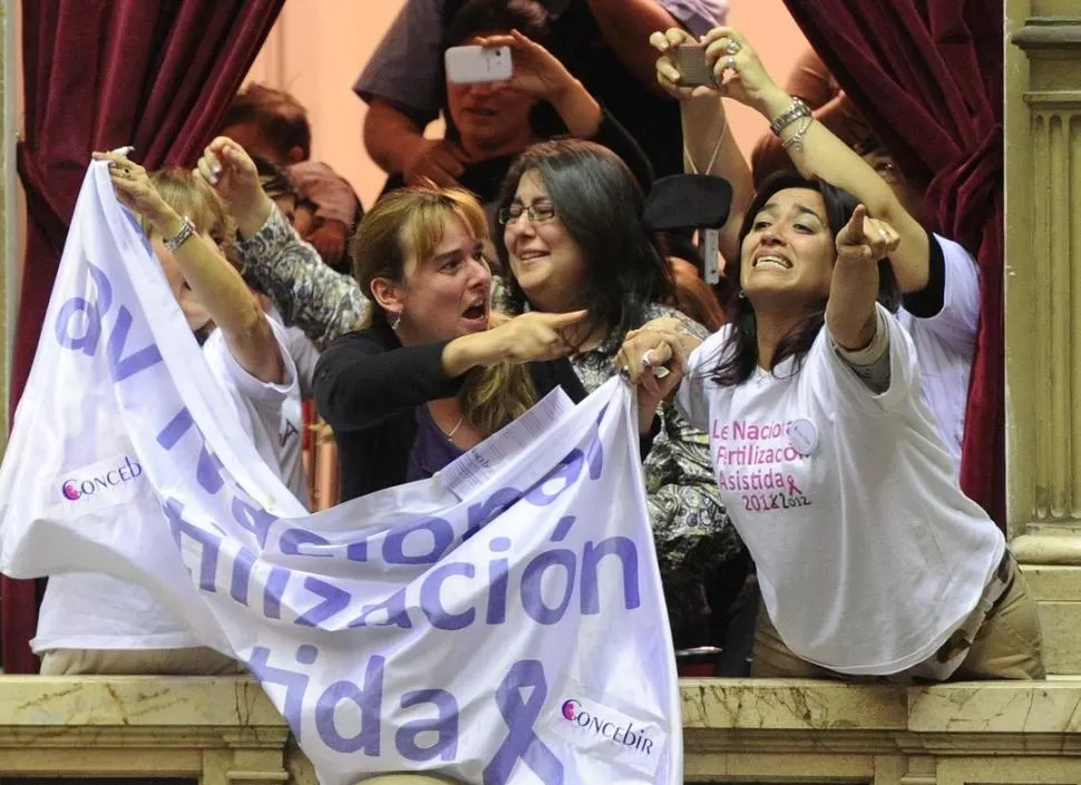 ALEGRÍA FRUSTRADA. La falta de adhesión a la ley nacional abre las puertas a las negativas de las obras sociales. TÉLAM (ARCHIVO) 