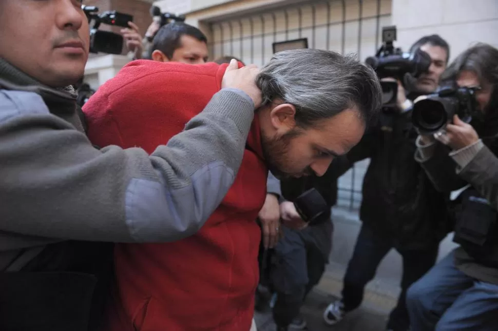 EN SILENCIO. Martín Ríos fue llevado ayer a tribunales pero no quiso declarar. télam