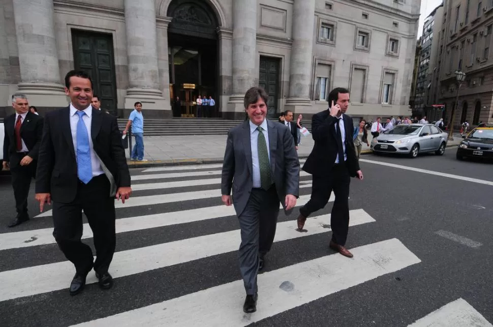 ÚLTIMOS TRASCENDIDOS. Amado Boudou, siempre sonriente, estaría analizando la posibilidad de una licencia. dyn (archivo)