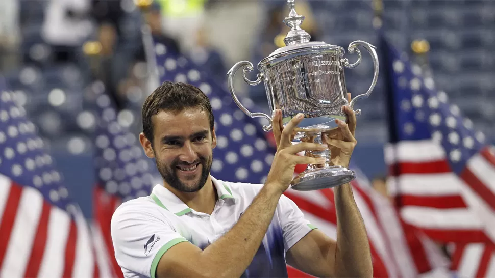 DUEÑO DE LA COPA. El croata Marin Cilic, de 25 años, se impuso a Nishikori al cabo de dos horas y se quedó con la primera final de un Grand Slam desde la edición 2005 de Roland Garros, disputada por dos debutantes en esa instancia como el argentino Mariano Puerta y quien fuera su vencedor el 23 de mayo de ese año, el español Rafael Nadal. REUTERS