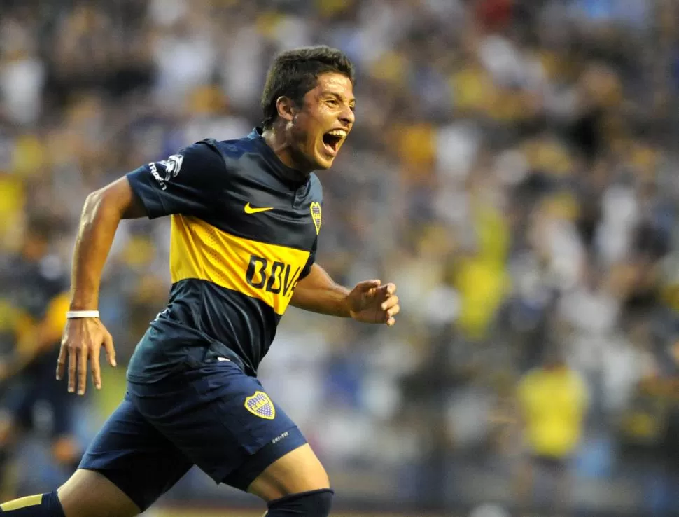 LA BOCA LLENA DE GOL. Sebastián Palacios celebra una de sus conquistas. Apareció cuando ya cundía el nerviosismo. telam 