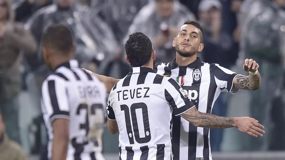 ENCENDIDOS. Maxi Pereyra y Tevez se convirtieron en piezas clave del equipo de Turín. ARCHIVO