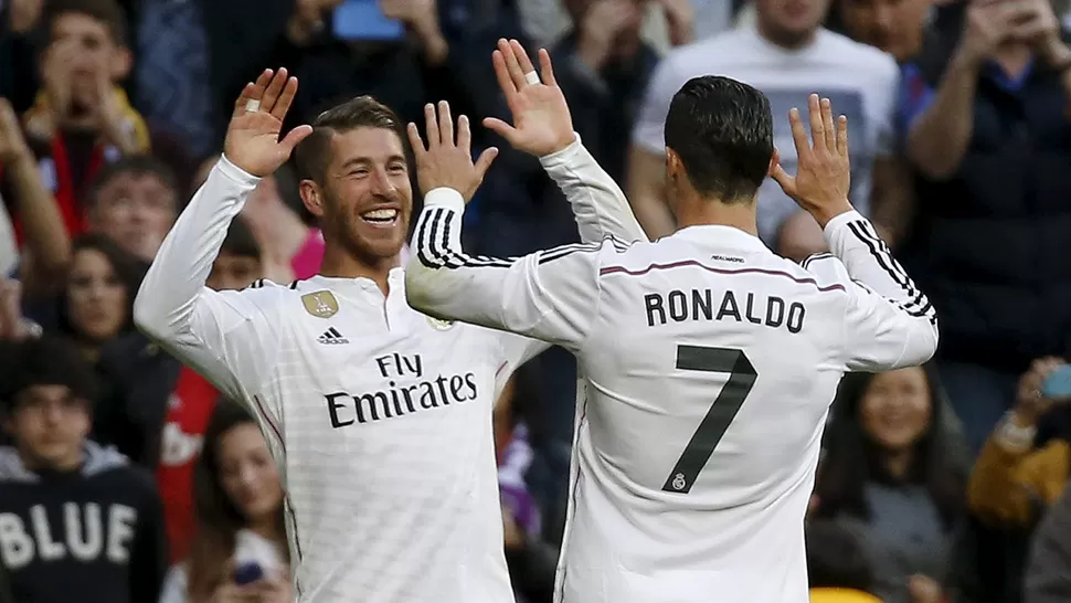 COMBINACION PERFECTA. Con un centro, CR7 habilitó a Ramos, que se encargó de abrir el marcador en el Bernabéu. REUTERS