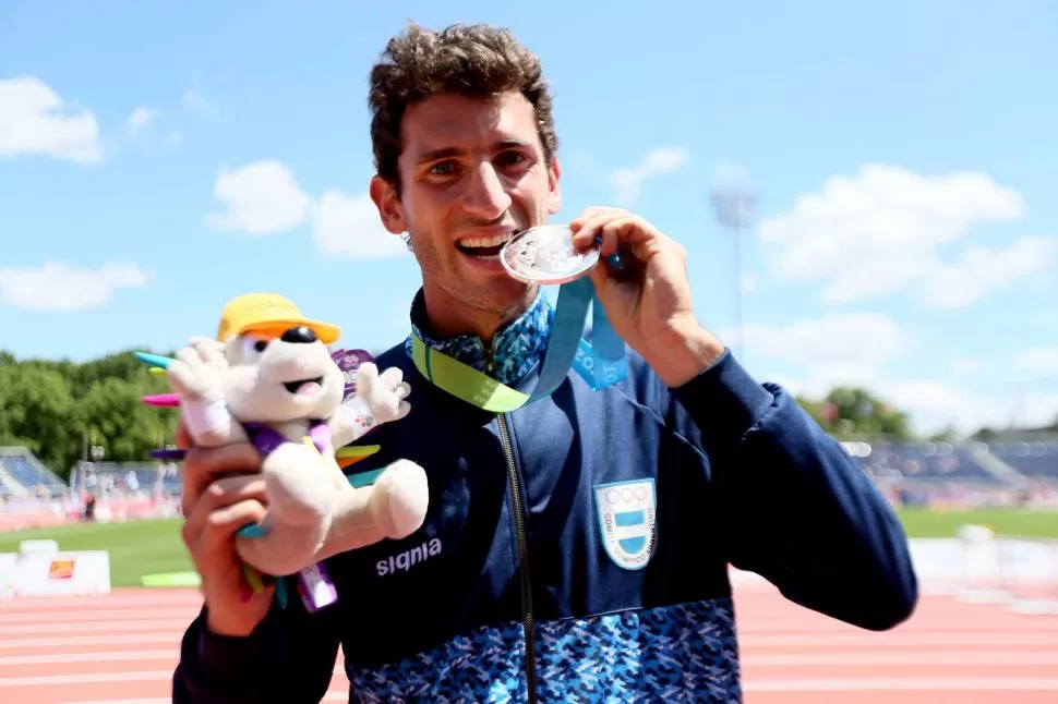 FELIZ. Germán Chiaraviglio, con su salto de ayer, rompió dos récords. telam