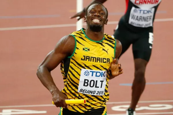 Bolt consiguió su triplete dorado en Pekín