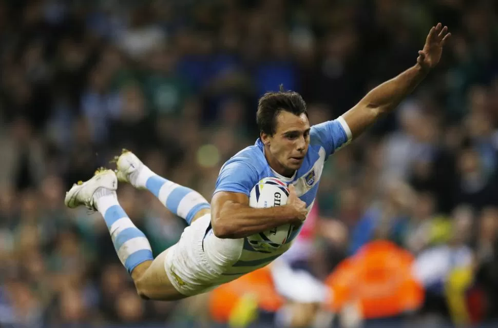 SÍMBOLO. La “palomita” de Juan Imhoff (tryman histórico de Los Pumas en Mundiales, con 7) contra Irlanda es una de las postales favoritas de la Copa del Mundo. reuters (