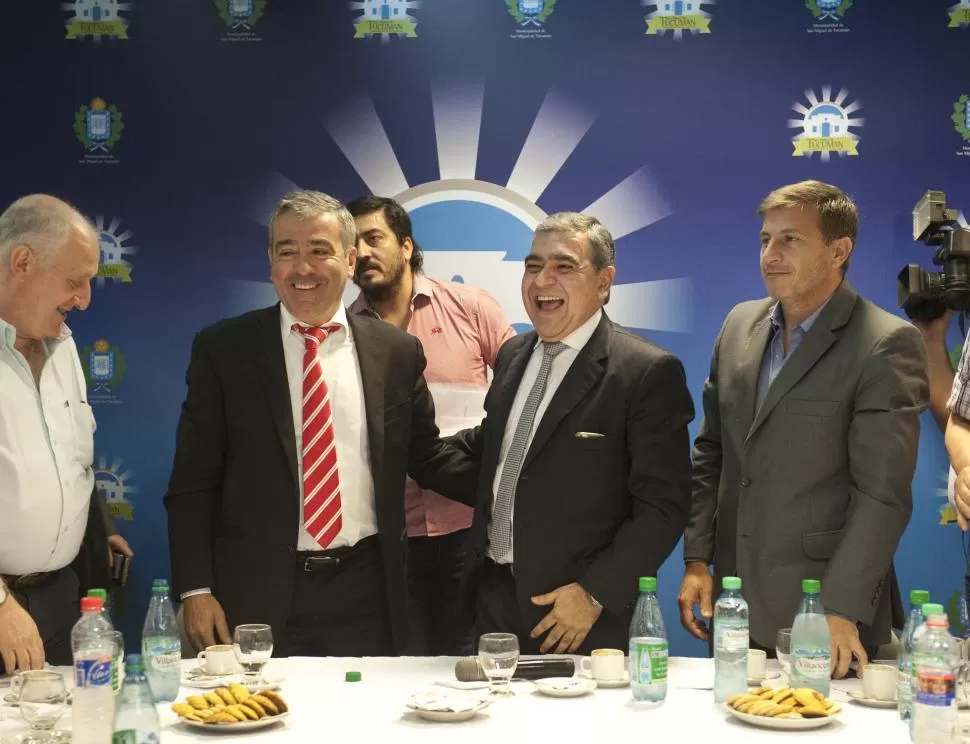 TODOS FELICES. El radical Ascárate, Cano, Alfaro y Berarducci (de izquierda a derecha) tras la reunión en el municipio. la gaceta / foto de florencia zurita