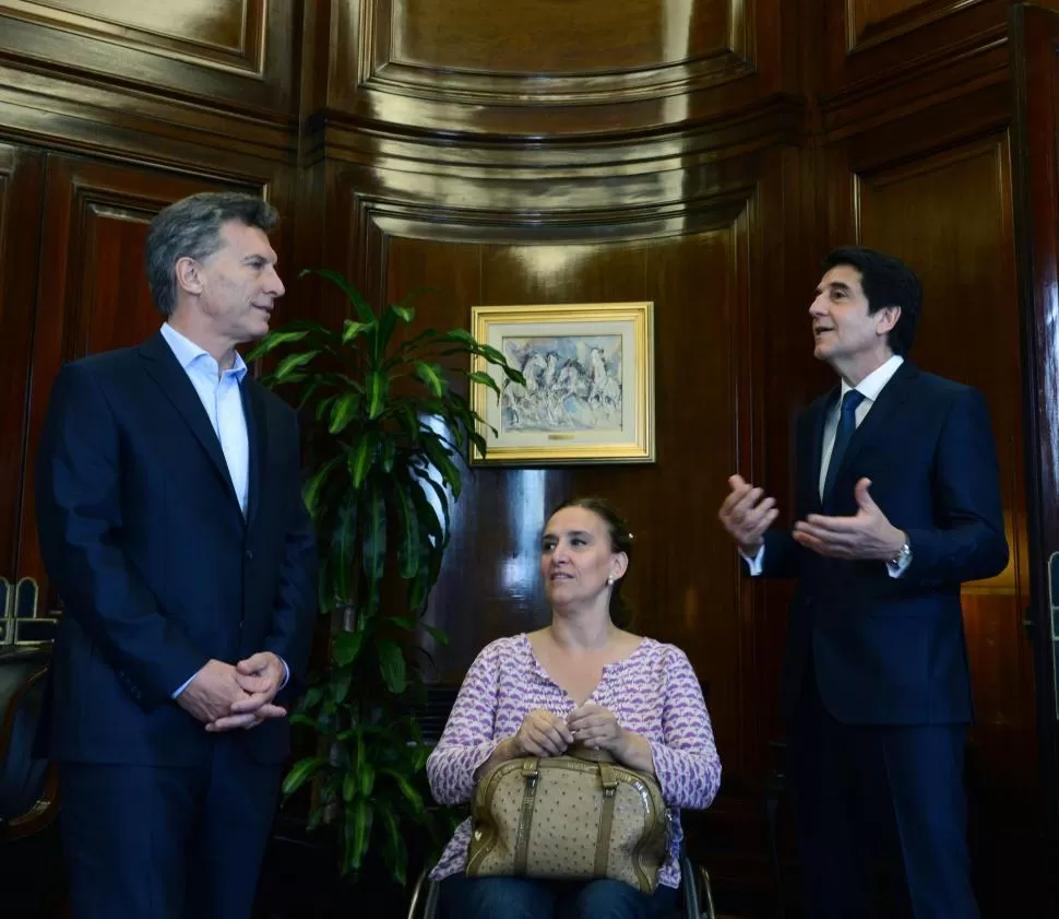 DESIGNACIÓN. Macri y Michetti acompañaron a Melconian en el acto oficial. dyn