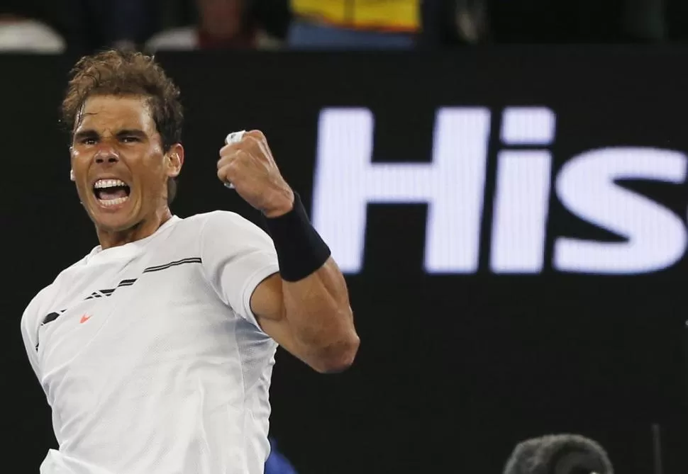 CLÁSICO. Nadal y una de las tantas veces que hizo su festejo: el grito de “El Matador”. Raonic no pudo con su potencia. Reuters