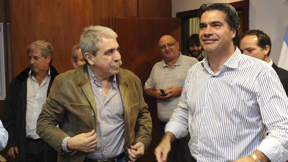 PROCESADOS. Los ex jefes de Gabinete Aníbal Fernández y Jorge Capitanich. FOTO TOMADA DE UNOENTRERIOS.COM.AR