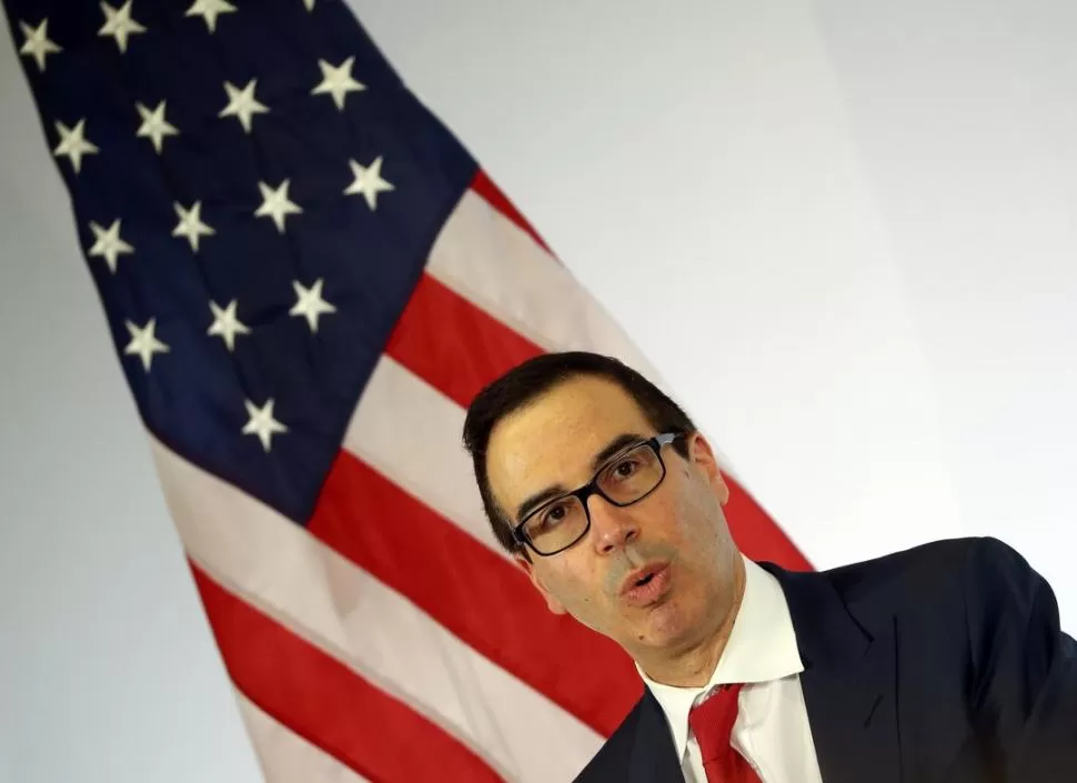 VOCERO. El secretario de Tesoro de EEUU, Mnuchin, participó del evento. reuters