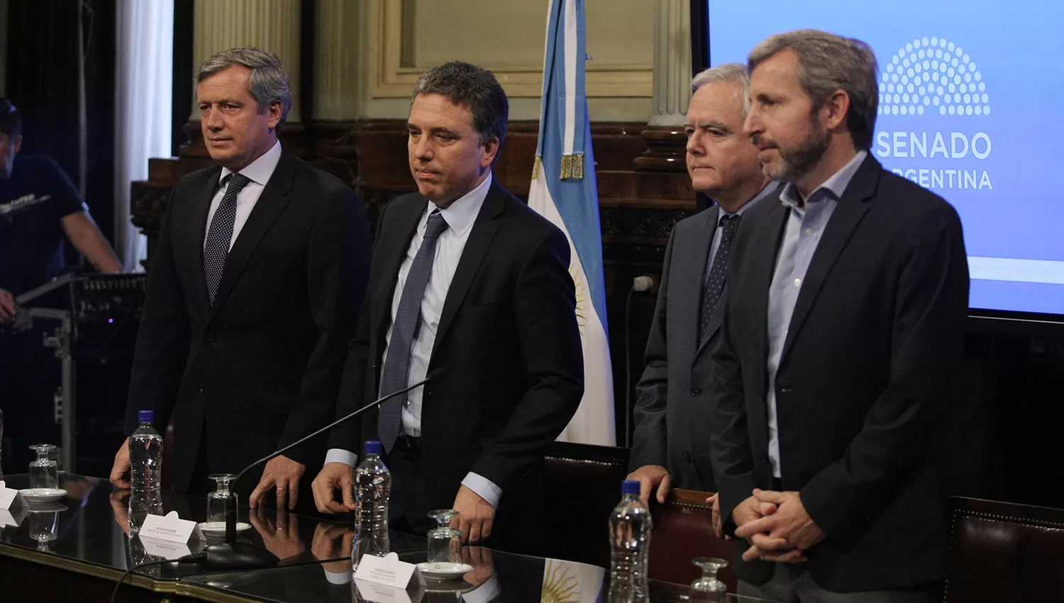 EN EL SENADO. Nicolás Dujovne (segundo desde la izquierda), flanqueado por Emilio Monzó, Federico Pinedo y Rogelio Frigerio. DyN