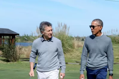 Ajeno a la campaña, Macri jugó al golf con Obama