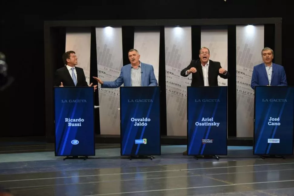 DISCUSIÓN. Los candidatos Ricardo Bussi, Osvaldo Jaldo, Ariel Osatinsky y José Cano mantuvieron algunos cruces efusivos durante el debate de LA GACETA. la gaceta / fotos de juan pablo sánchez noli