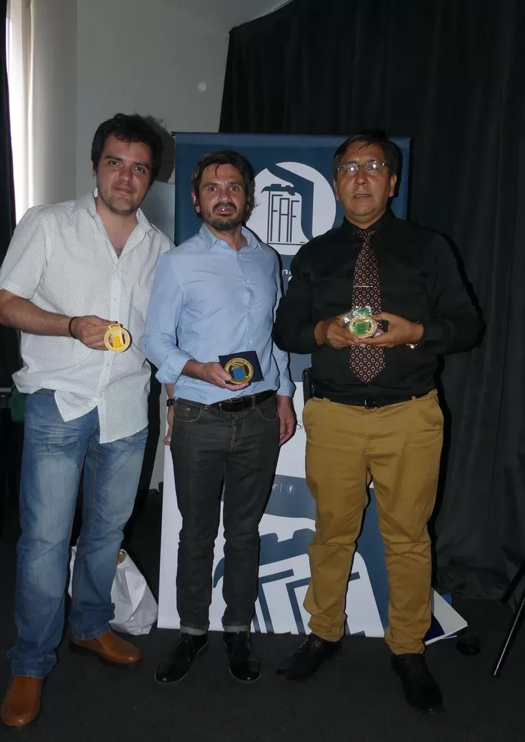 LOS TRES GALARDONADOS. Aníbal Ruiz, Roberto Geria y Osvaldo Ripoll.  