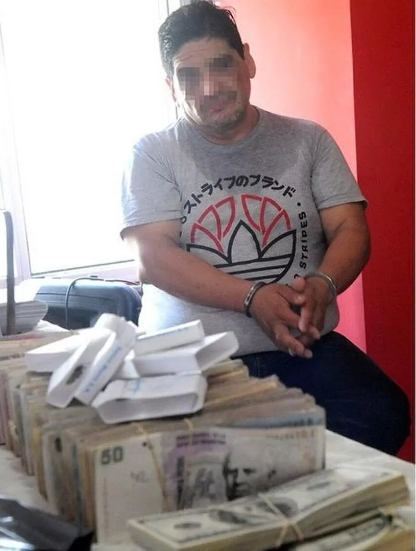 IMAGEN QUE SE REPITE. Monteros, sindicalista de la Uocra, fue detenido y le hallaron dinero en efectivo y armas. telam