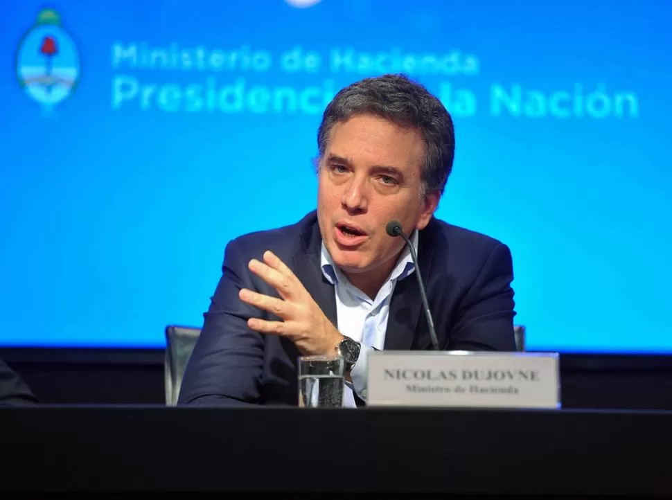 OPTIMISMO. Nicolás Dujovne aseguró que todos los gastos primarios están creciendo por debajo de la inflación y ratificó la meta del 15% para este año. telam