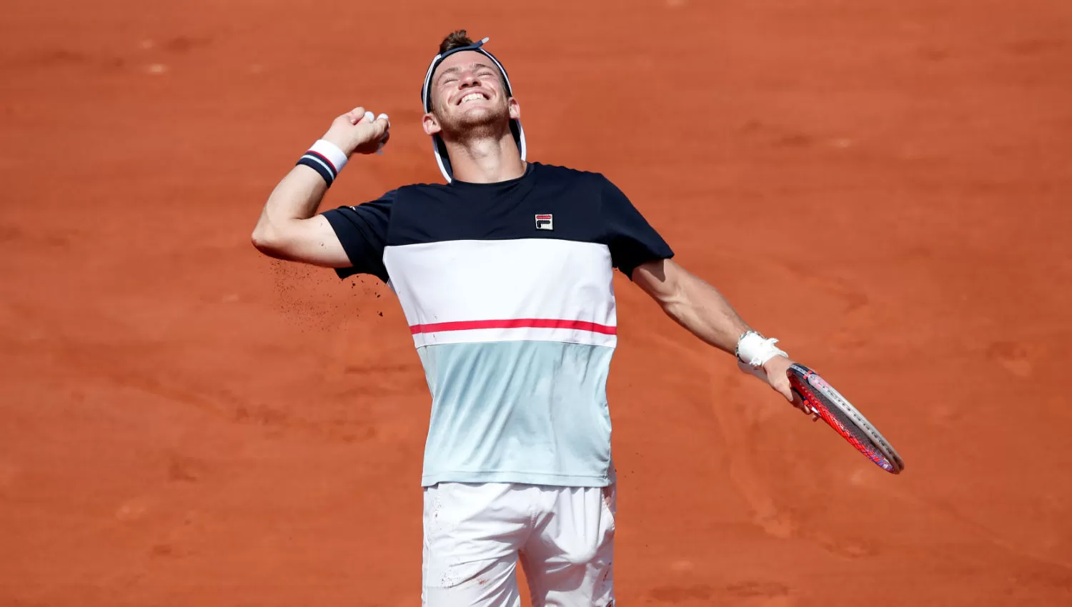 HISTÓRICO. Schwartzman celebra su victoria ante Anderson.  REUTERS
