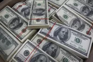 El dólar tiende a la calma; bajan las tasas 