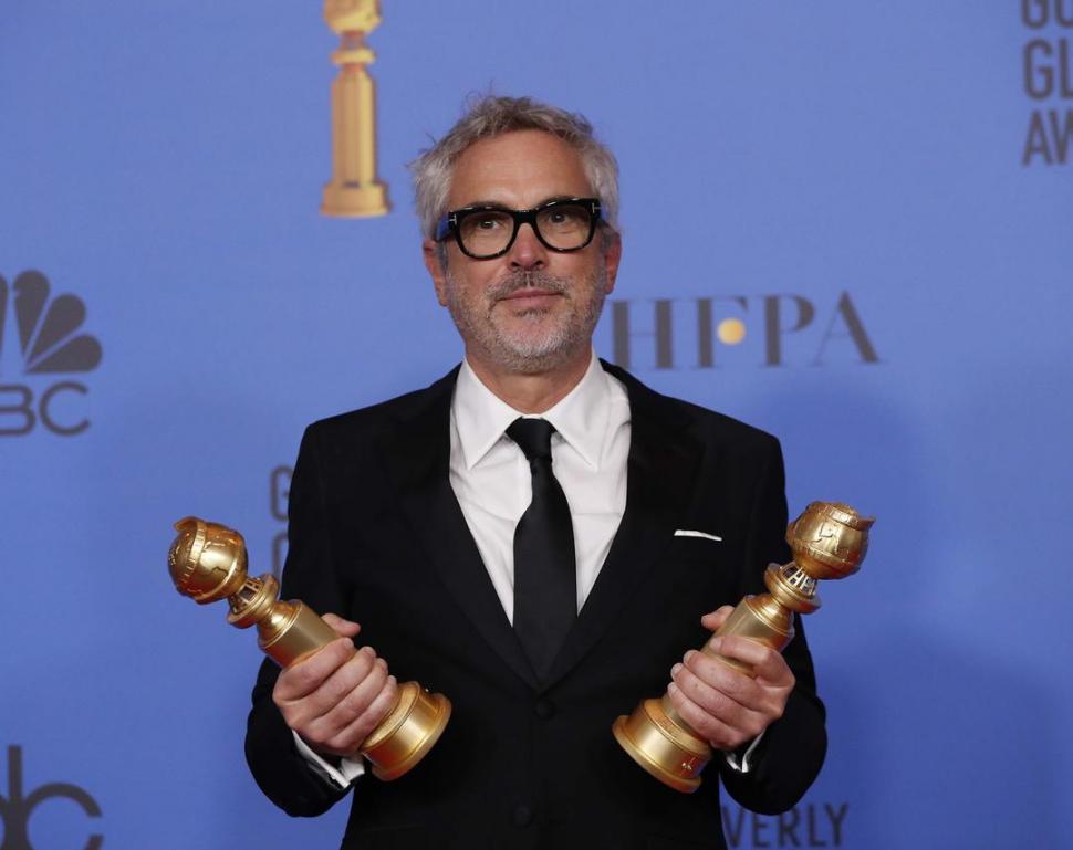 DOBLETE. Cuarón ganó a filme extranjero y a director. reuters 