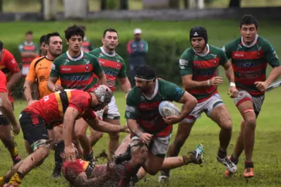 Tackleando bajo la lluvia