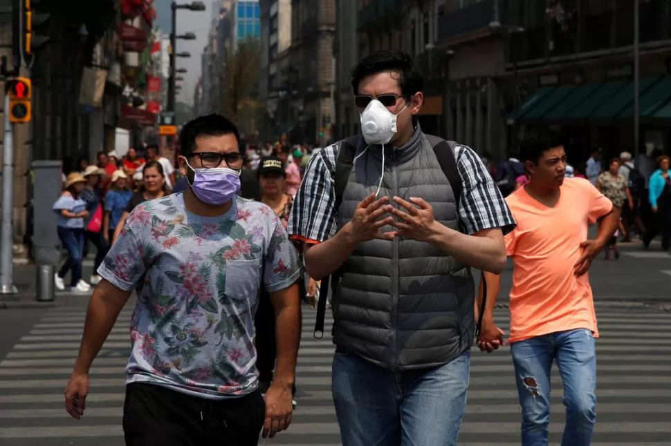 DIFÍCIL RESPIRAR. Durante varios días, la metrópolis estuvo cubierta por un humo denso y húmedo.  reuters