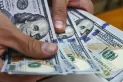 El dólar vuelve a tener una fuerte suba y cotiza por arriba de los $60