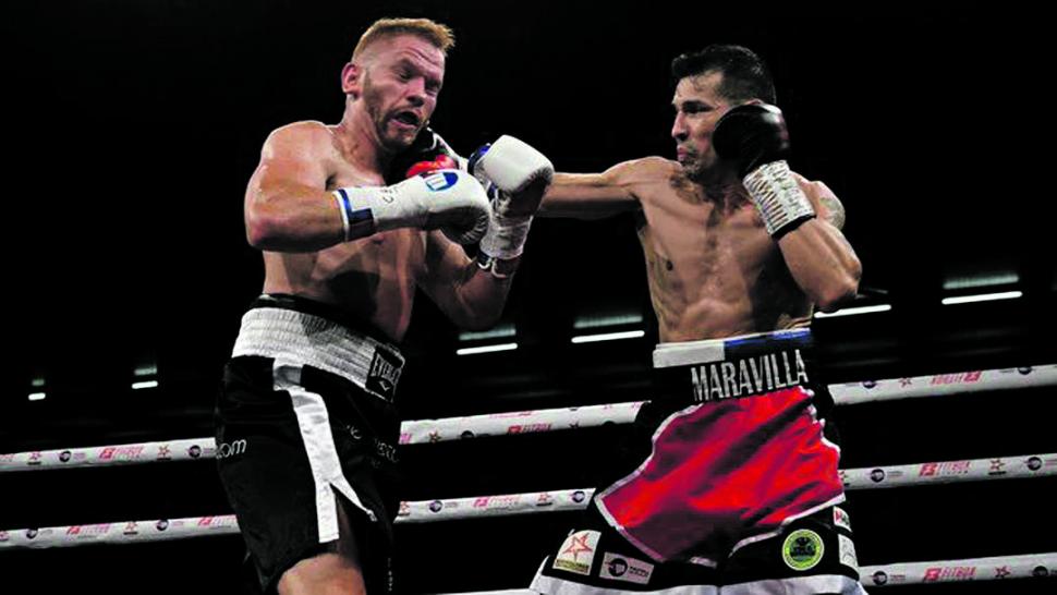 DOMINADOR. El puño derecho de Maravilla Martínez se estrella en el rostro de su rival. El argentino lució lento en los desplazamiento, pero su técnica está intacta.