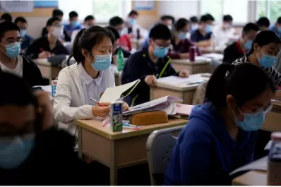 Más alumnos en China vuelven a la escuela de cara al inicio pleno del ciclo lectivo