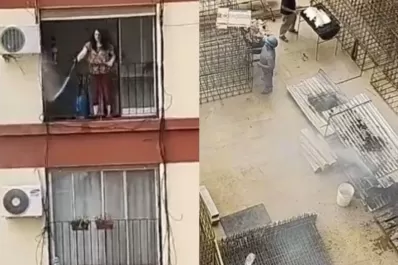 Insólito: albañiles hacían un asado y una vecina les tiró agua desde su balcón
