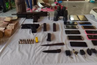 En un allanamiento secuestran una ametralladora, una pistola, 10 celulares, $ 200.000 y un auto