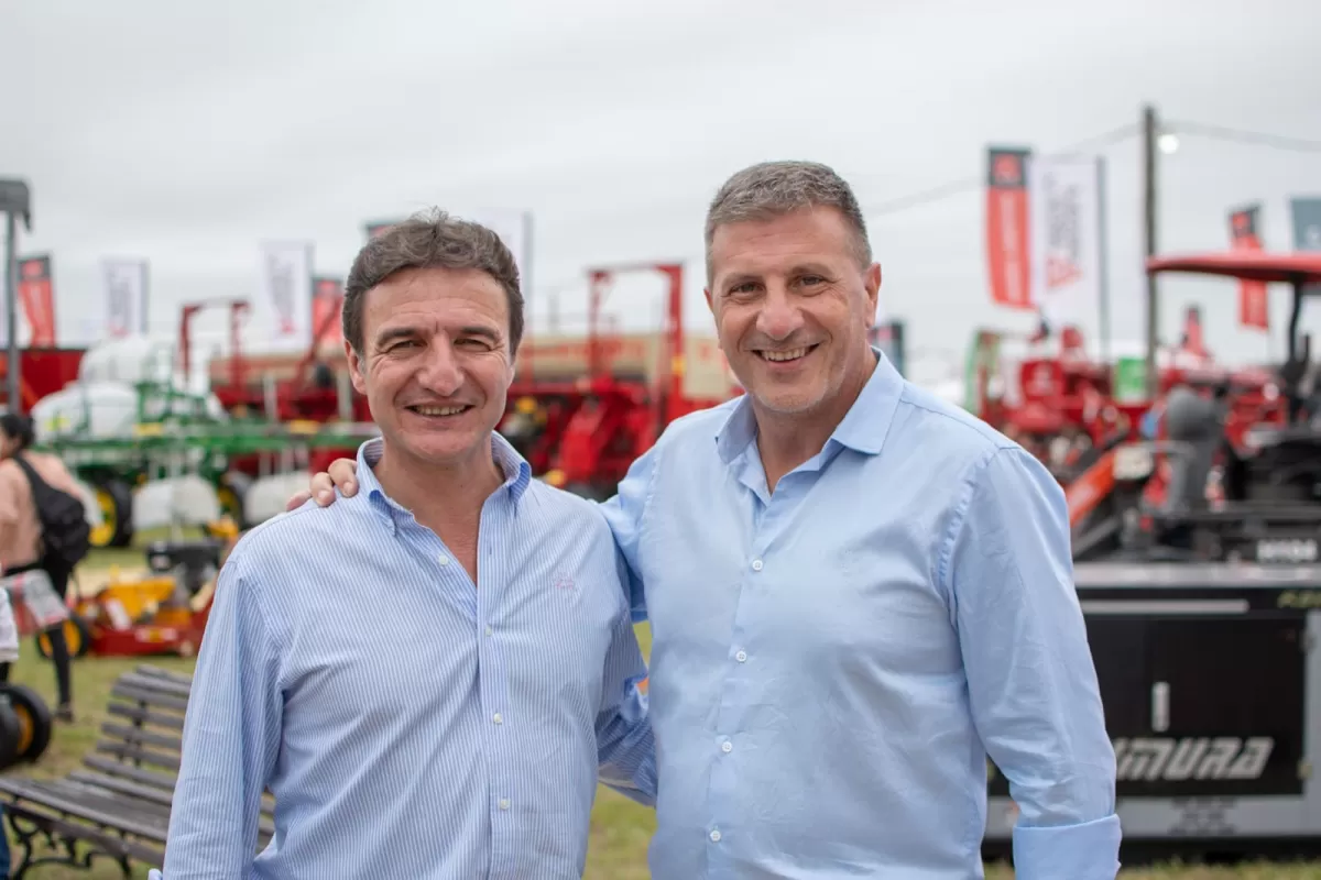 ENCUENTRO. Roberto Sánchez y Walter Berarducci en la Expo Apronor.