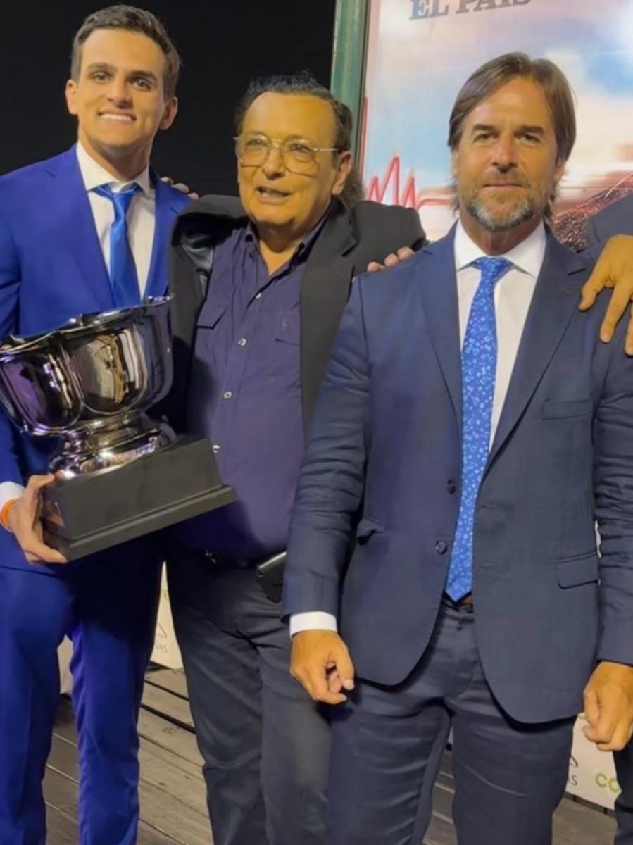 DESDE URUGUAY. José Sarquiz (centro), junto a su sobrino Marcos, y el presidente Luis Lacalle Pou. 