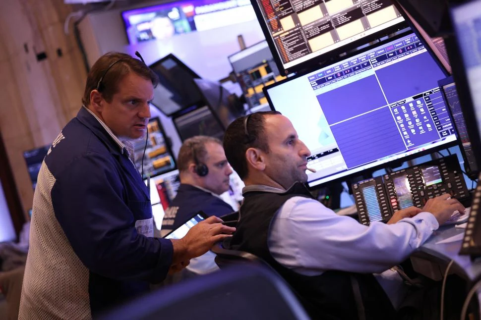 EN WALL STREET. Los operadores reaccionaron con cautela ante la decisión de la FED.