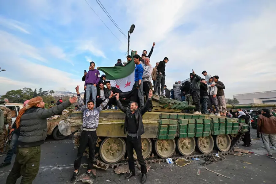 MILITANTES SIRIOS celebrando su victoria en Hamas./ AFP LOUAI BESHARA 