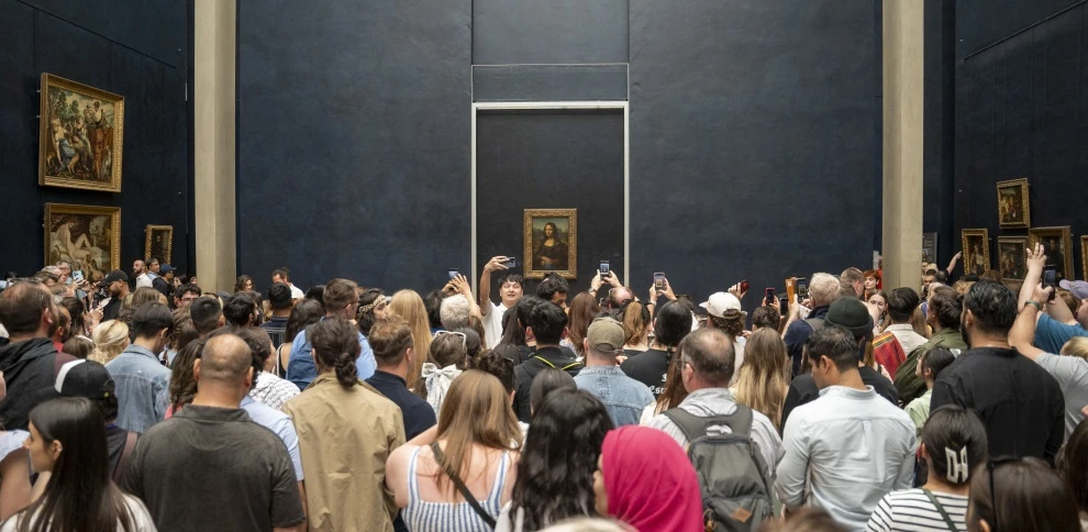 LOUVRE. Todos quieren tener sus imágenes de la “La Gioconda” pintada por Da Vinci,