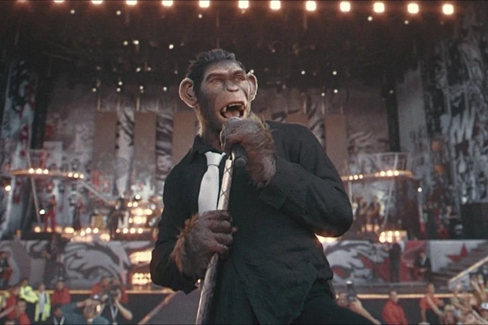 COMPORTAMIENTO HUMANO. En la película se representa a Williams como un chimpancé animado por CGI.