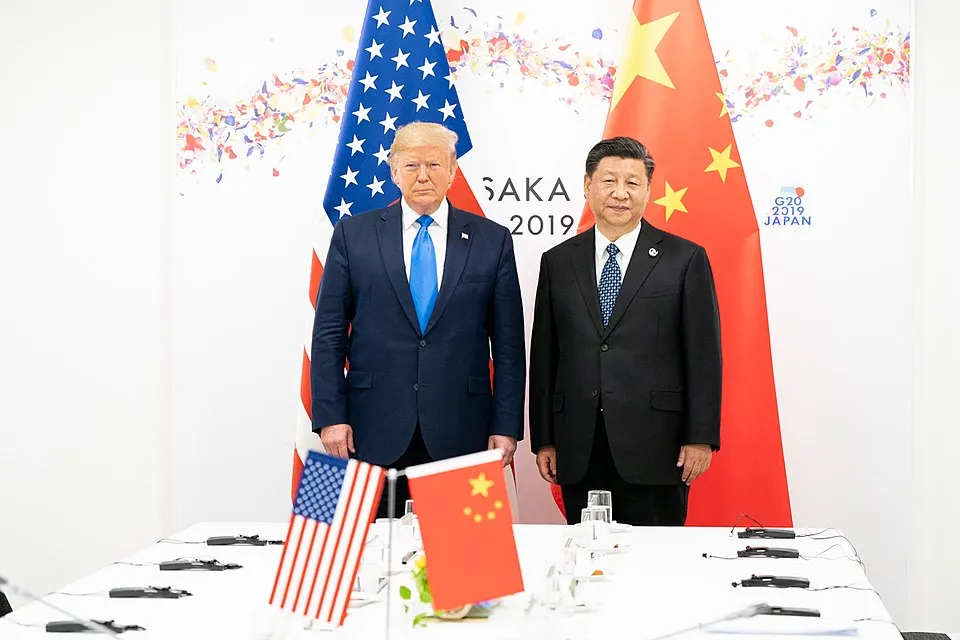 El presidente de los EE.UU., Donald Trump (Iz), con el presidente de China, Xi Jinping en una imagen de archivo